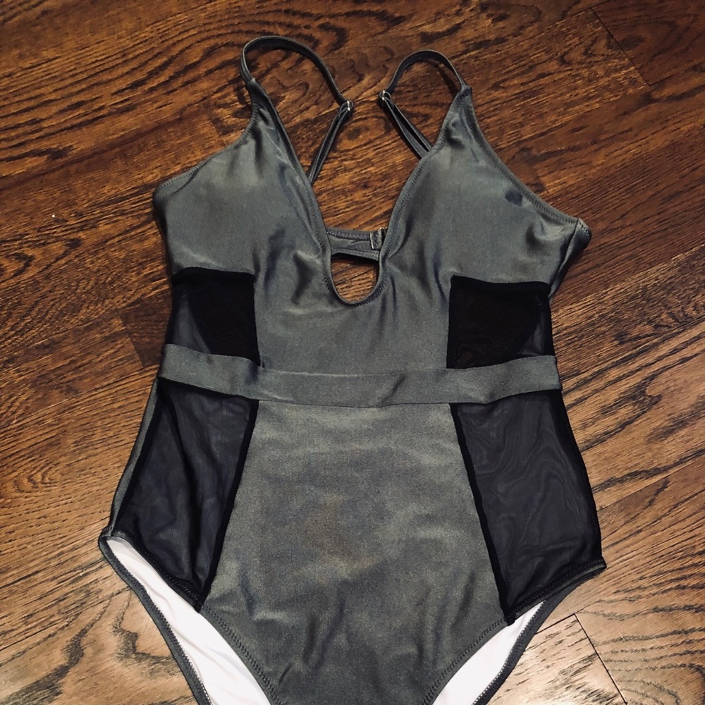 One piece with sheer side panels